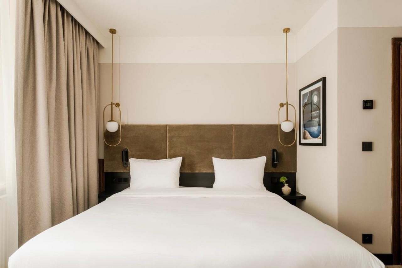 Royal Tulip Sand Kolobrzeg Bagian luar foto A bedroom at the hotel