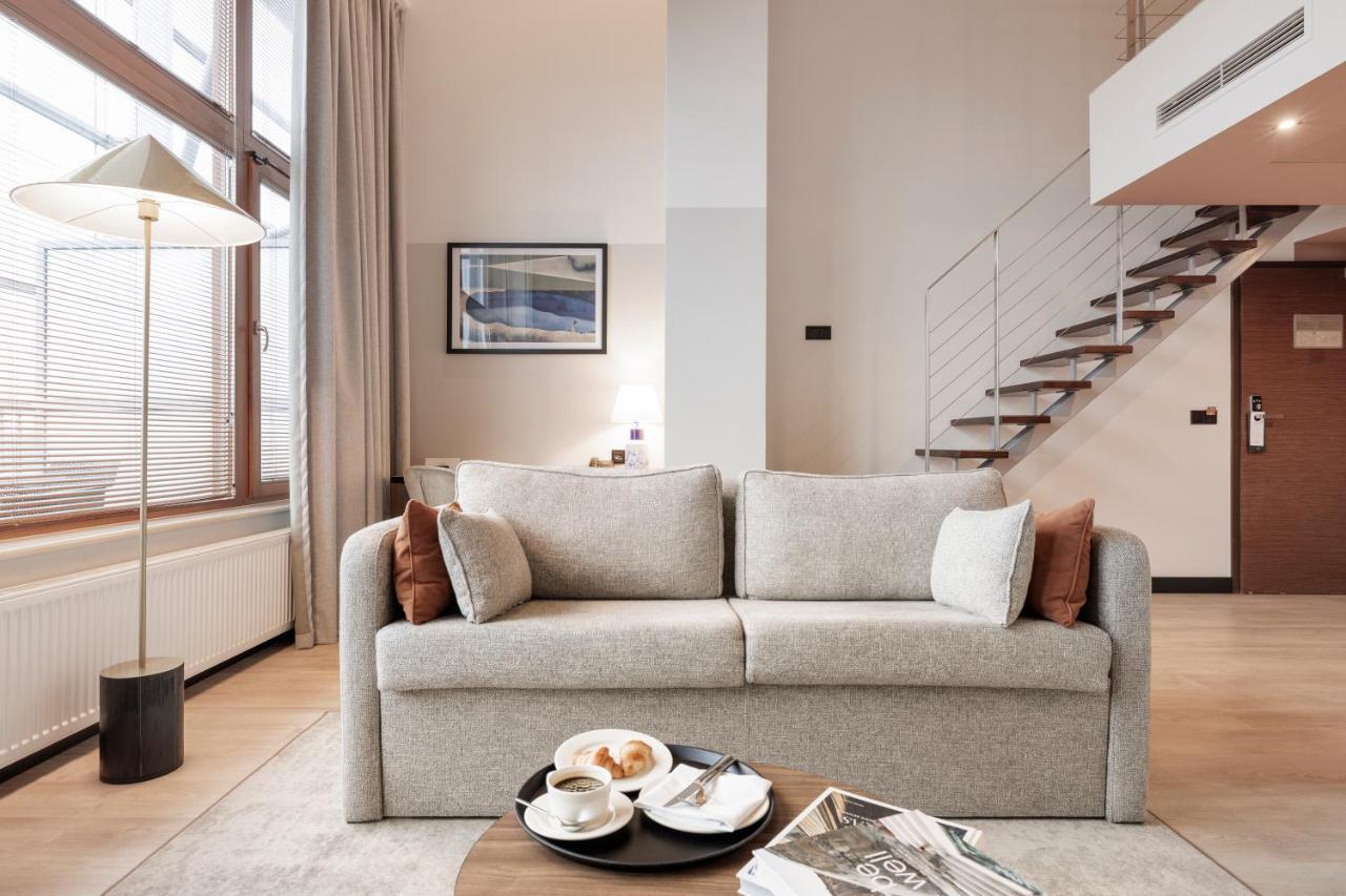 Royal Tulip Sand Kolobrzeg Bagian luar foto A sofa bed