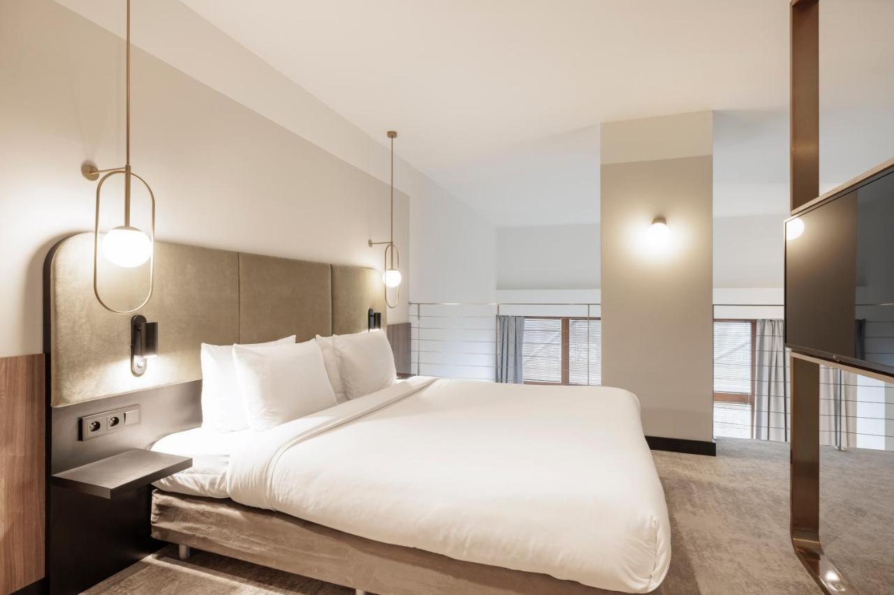 Royal Tulip Sand Kolobrzeg Bagian luar foto A bedroom at the hotel