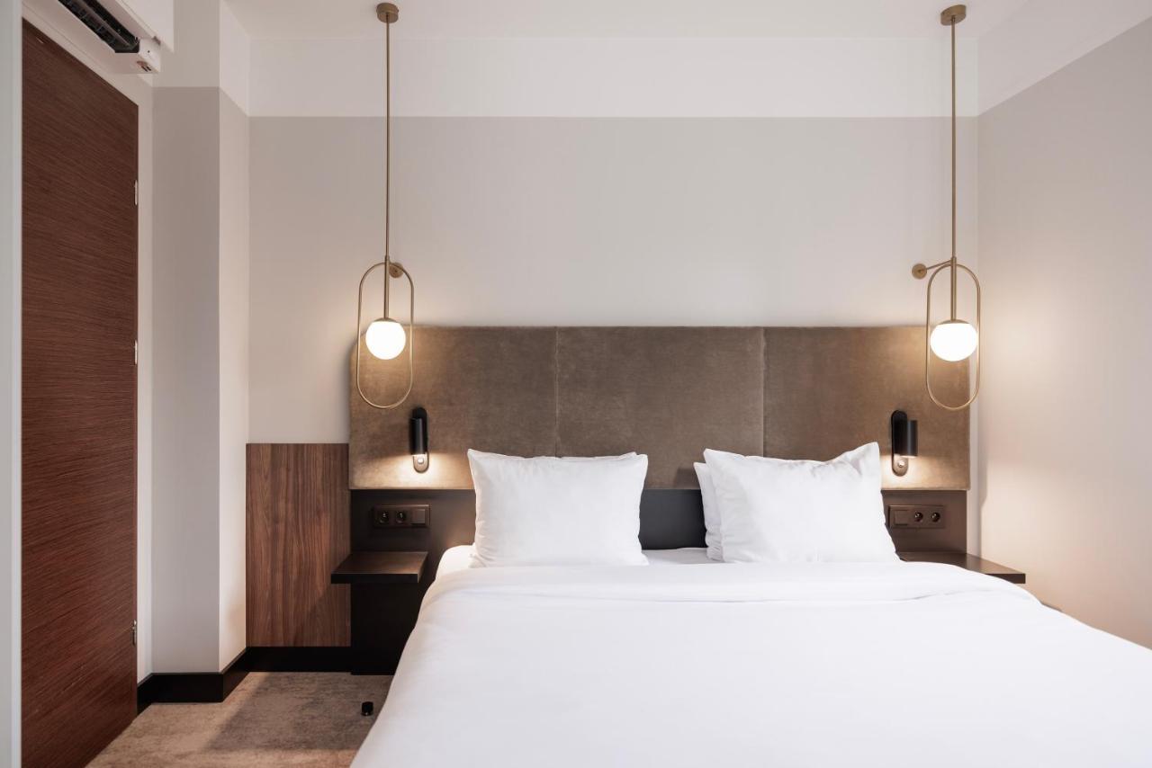 Royal Tulip Sand Kolobrzeg Bagian luar foto A bedroom at the hotel